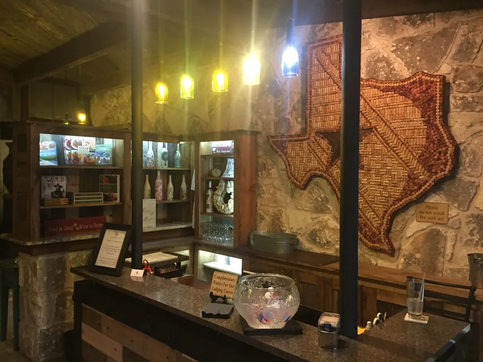 Service counter and lighted display cases in a commercial space